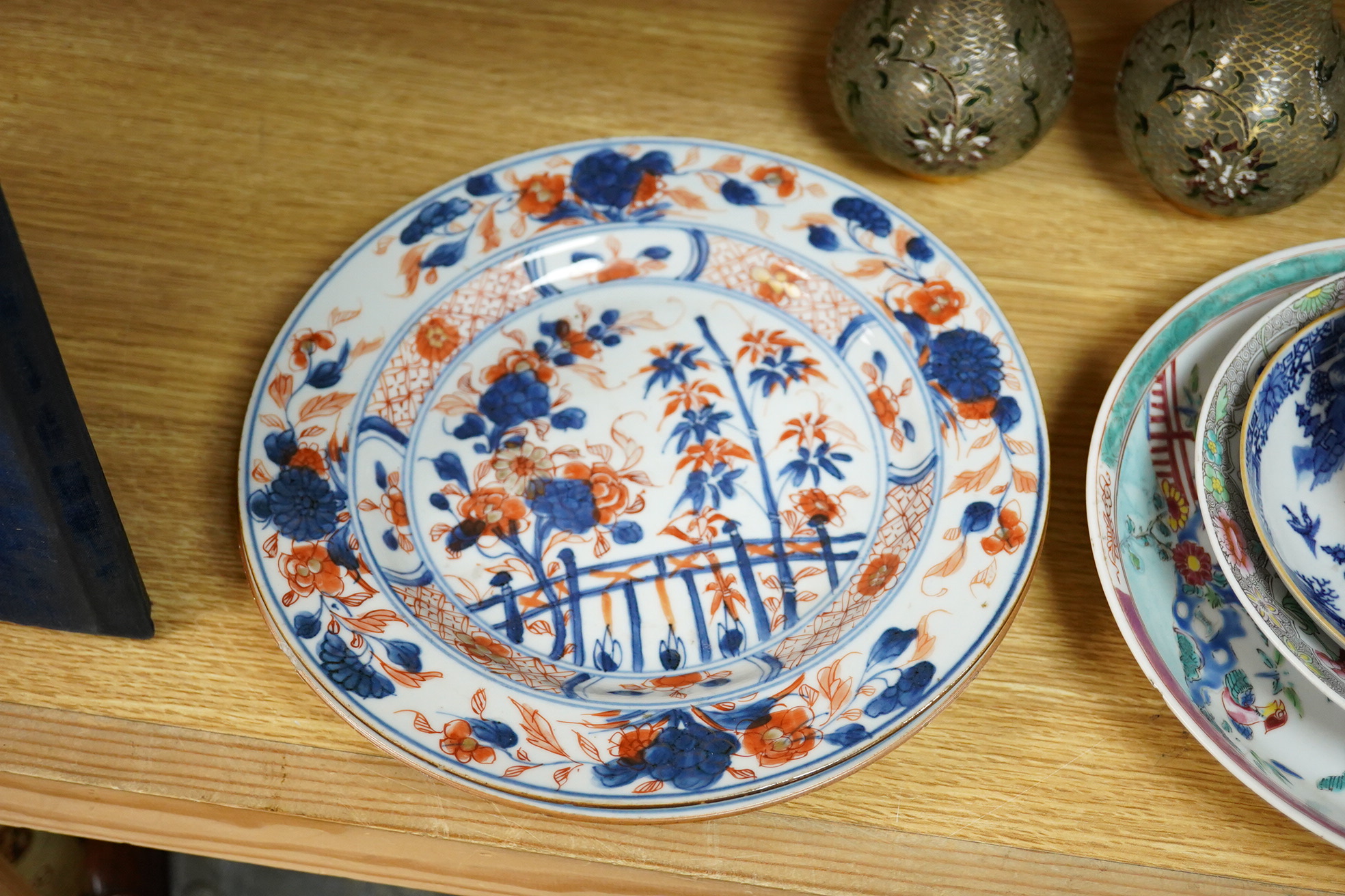 A pair of plique au jour Chinese vases together with a collection of Chinese export plates and dishes, largest 22cm in diameter